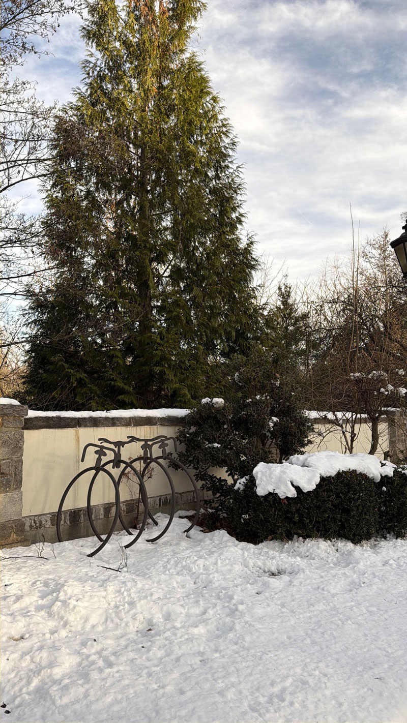 A bicycle-themed bike rack stands empty while Chanticleer is closed for the season. LR